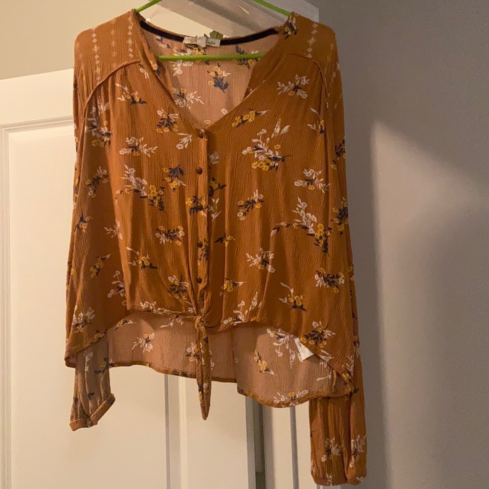 Long sleeve flowy blouse with a front tie